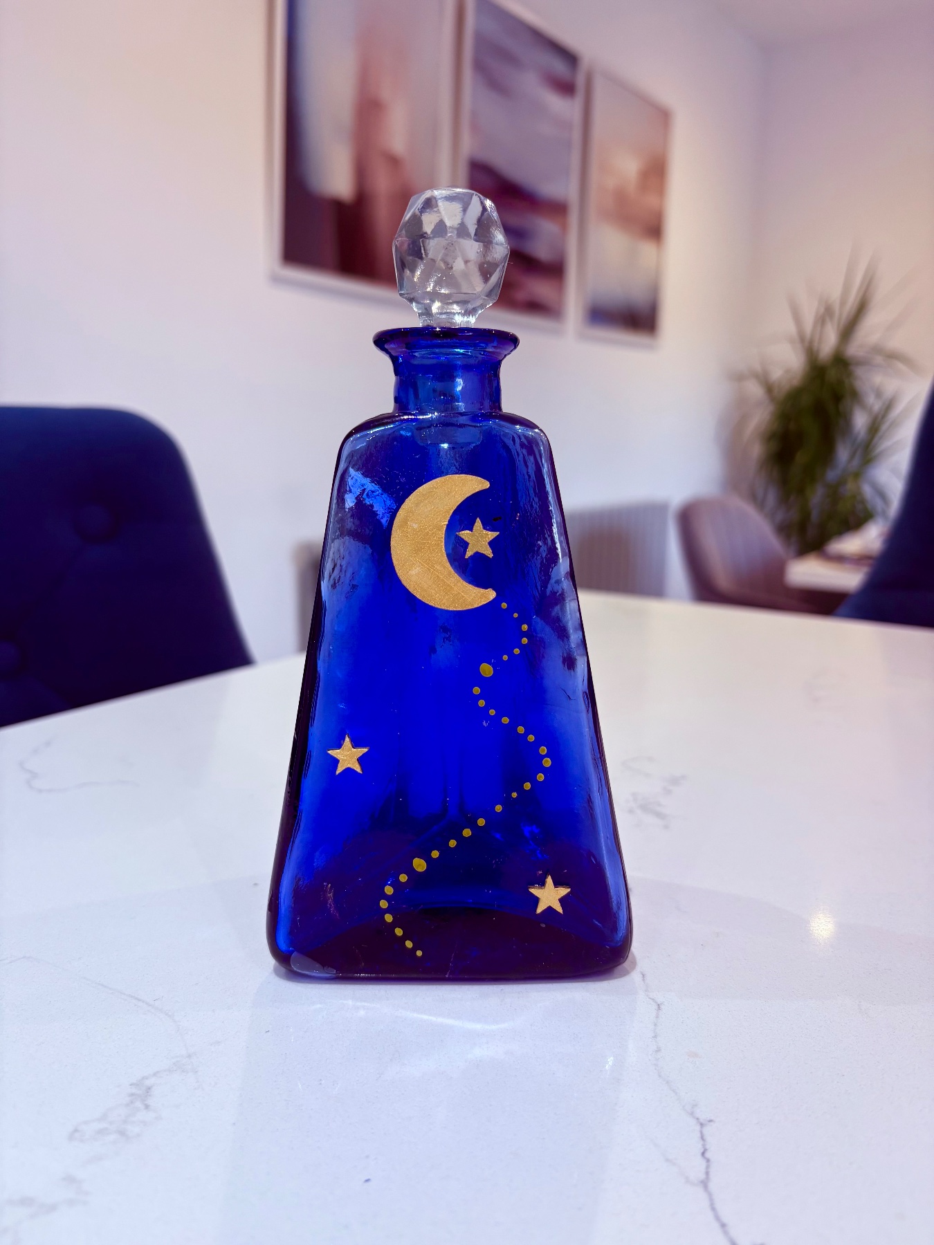 Upcycled vintage blue glass celestial bottle