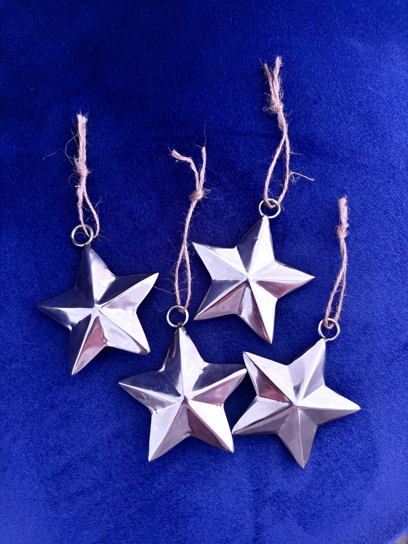 Set of 4 vintage silver metal hanging stars