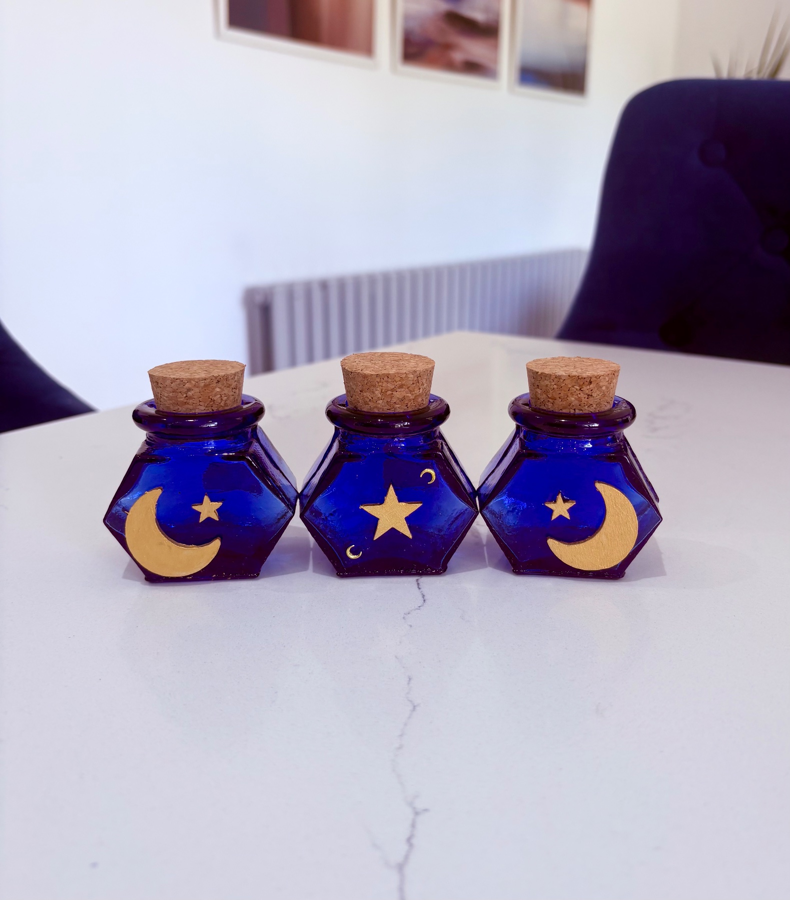 90s style celestial blue glass jars with cork stoppers