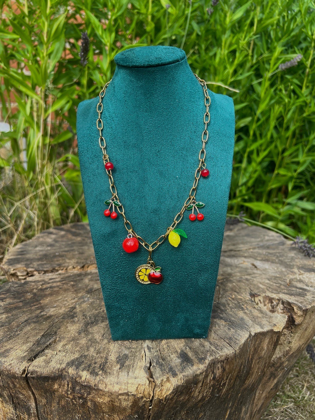 Gold chain necklace with charms