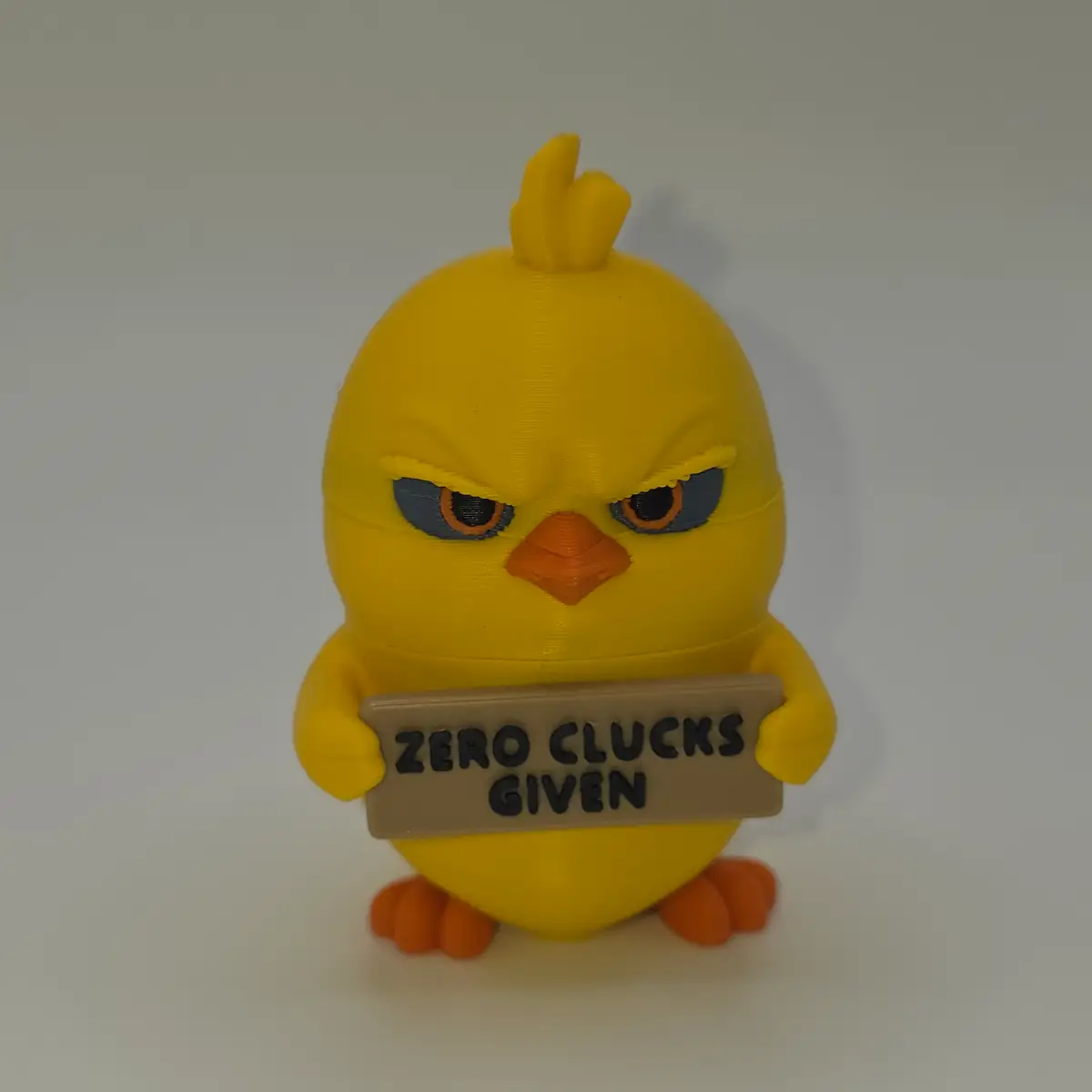 Funny chicken holding sign