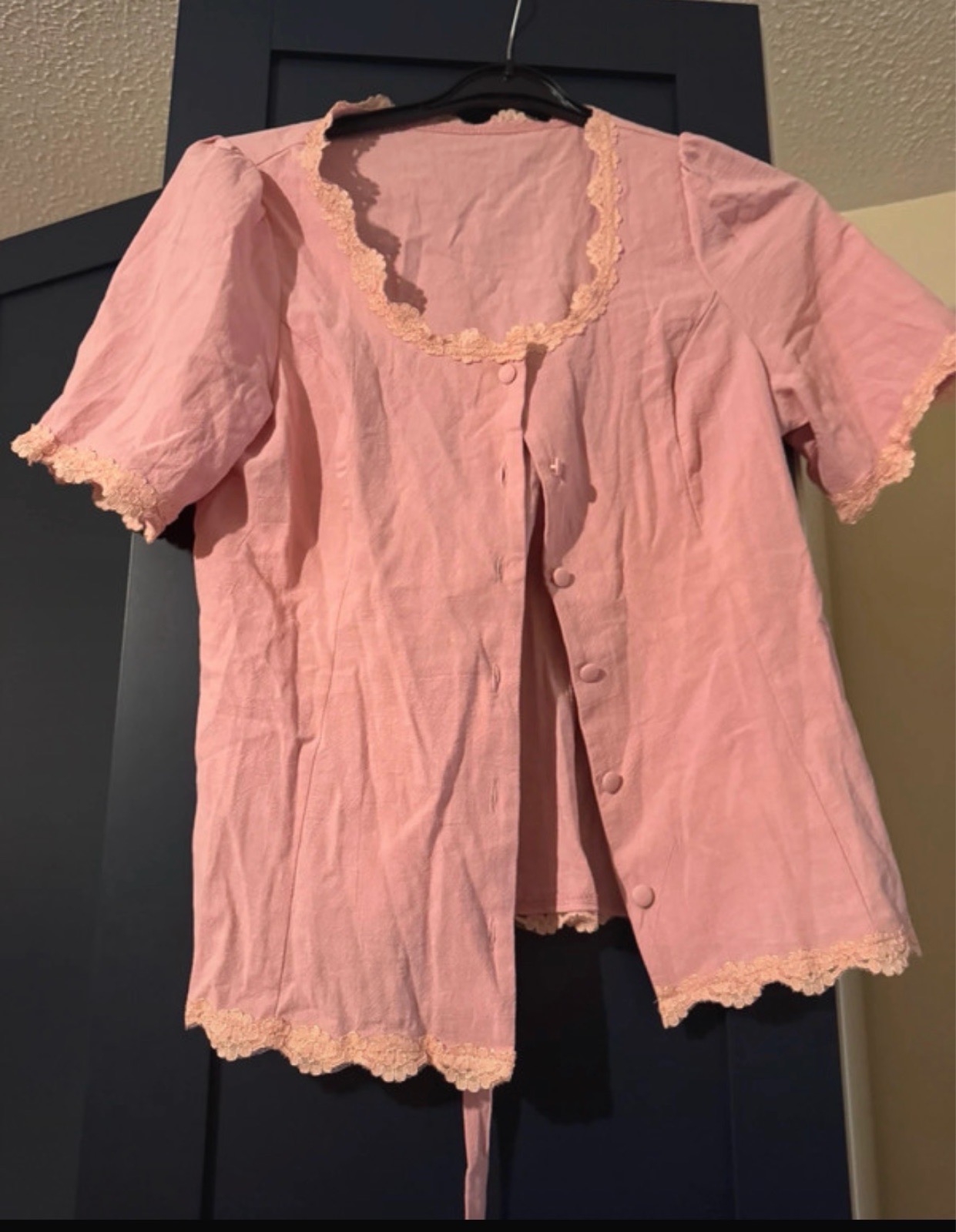 Short sleeve button up top with tie at the back