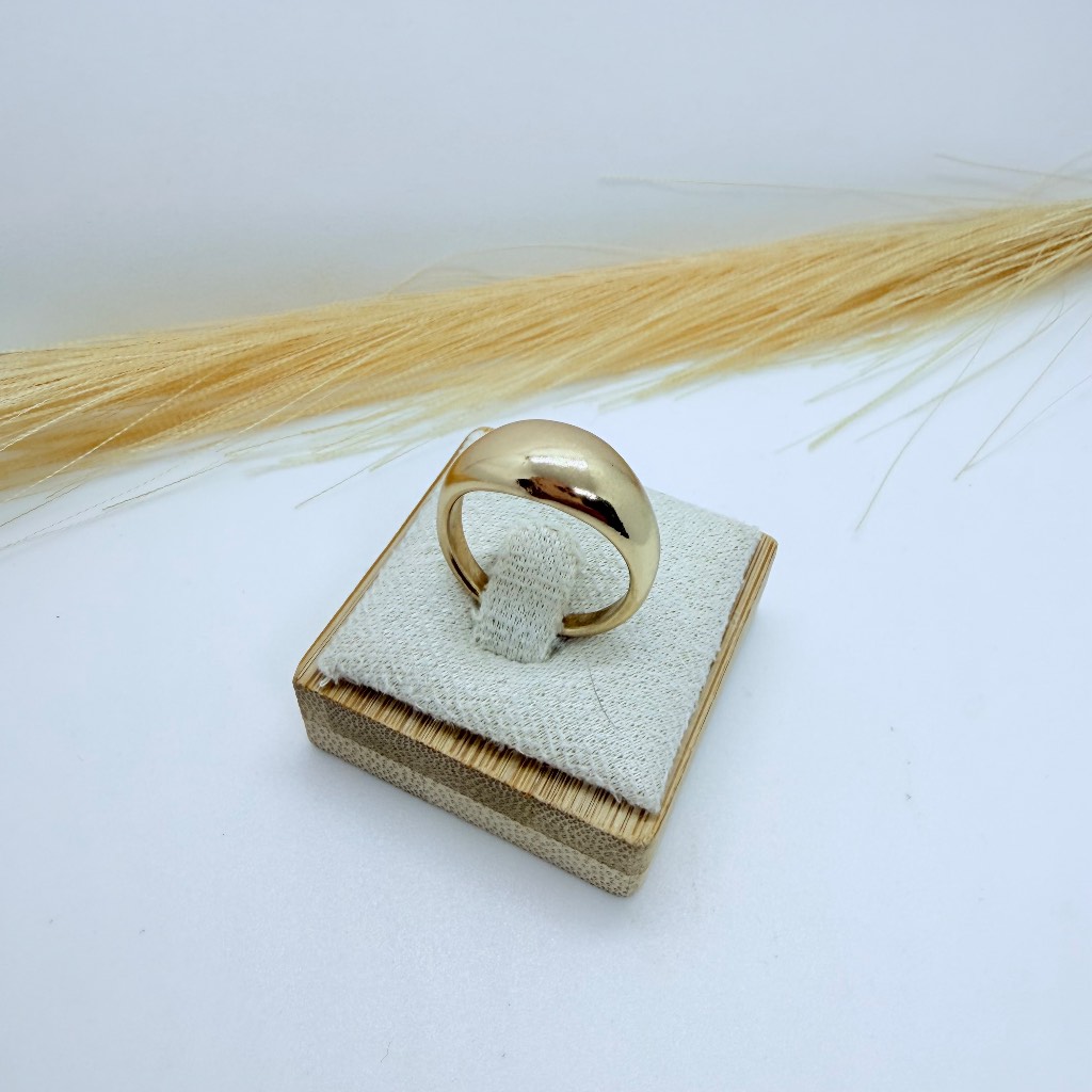 Stylish chunky dome ring with a polished gold-tone finish.