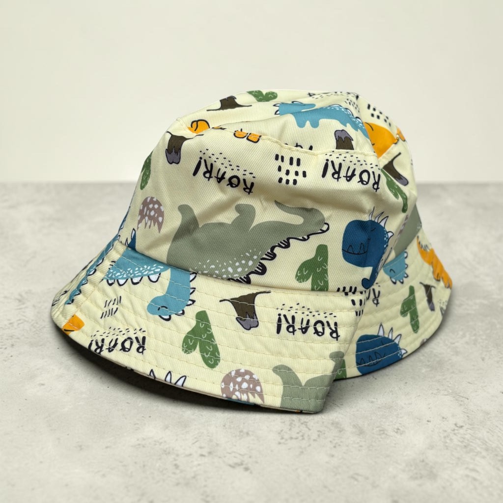 Kids cream dinosaur patterned adjustable bucket hat