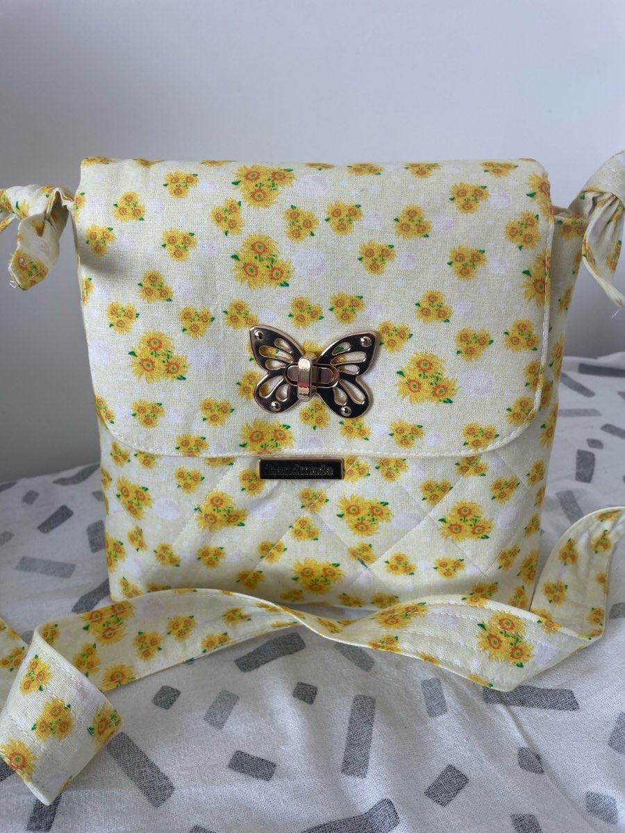 Handmade butterfly clasp bag