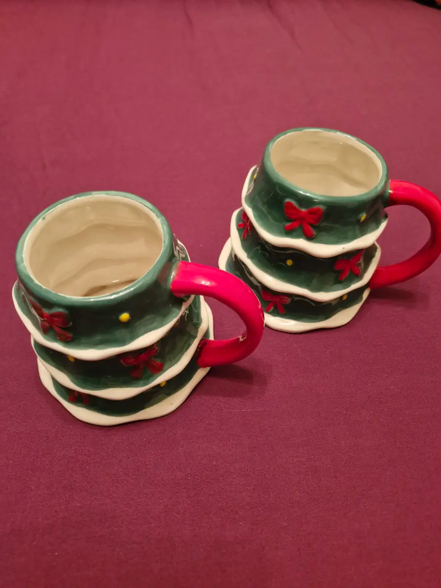 2x primark large christmas tree mugs.