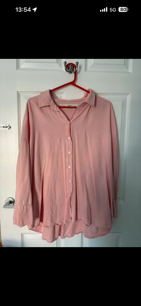 Women’s pink shirt/blouse