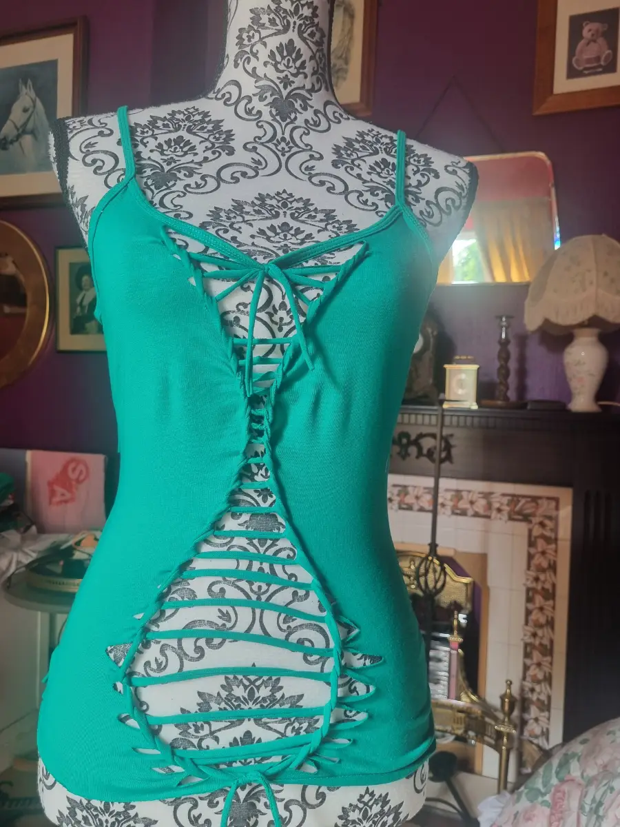 Teal vest, size M