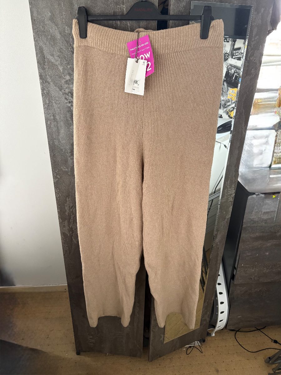 Beige knitted trousers