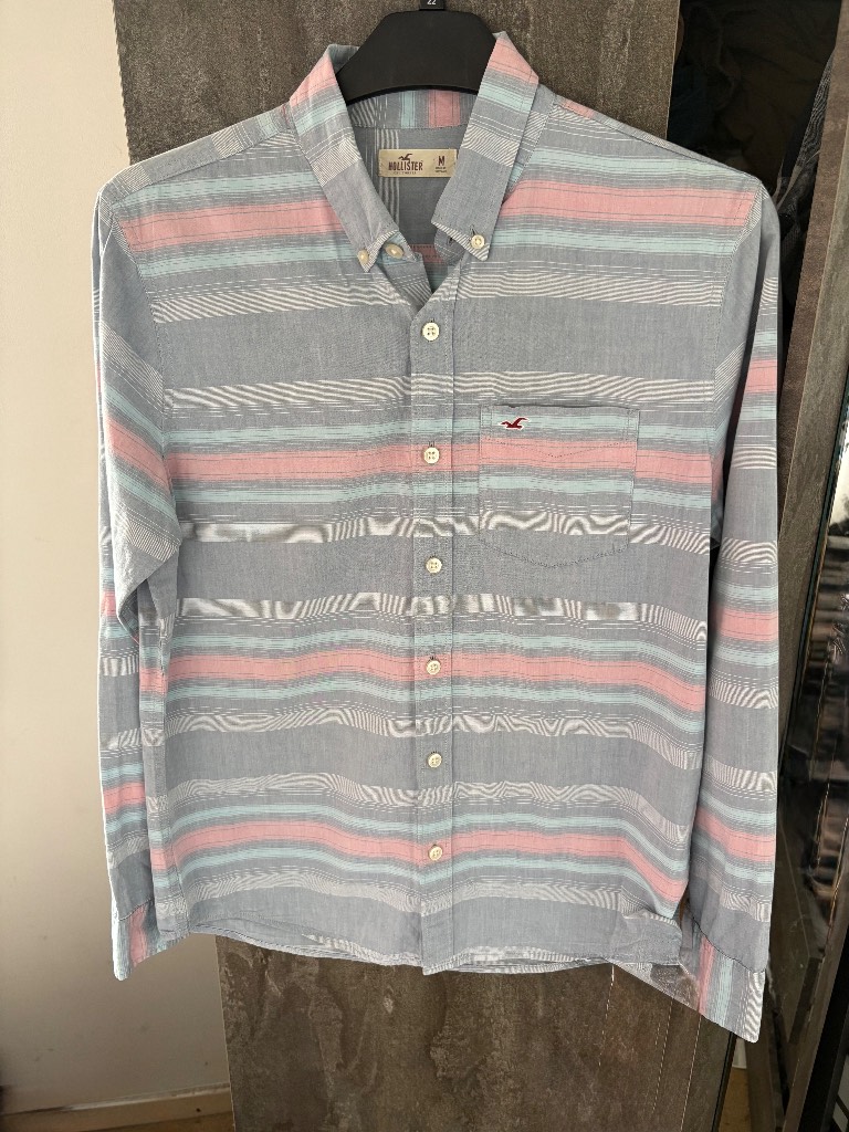 Blue white and pink striped long sleeve button up shirt