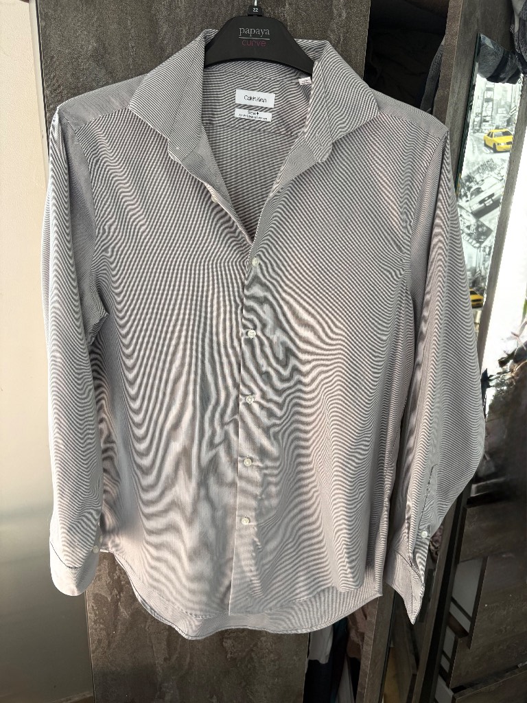 Grey and white long sleeve button up shirt