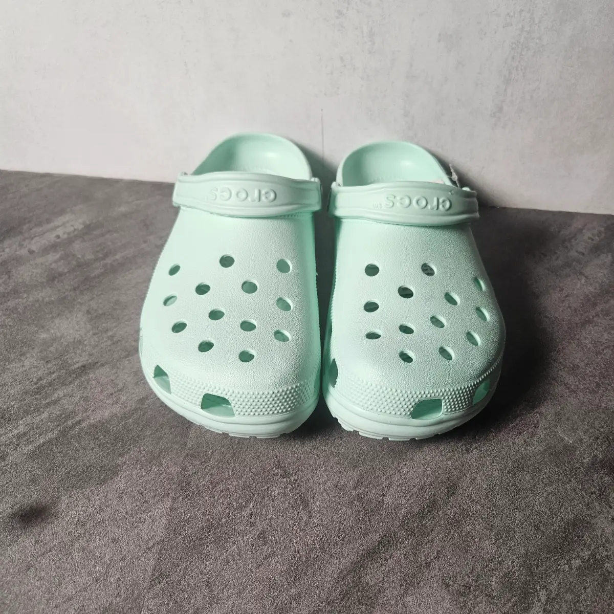 Pastel green crocs