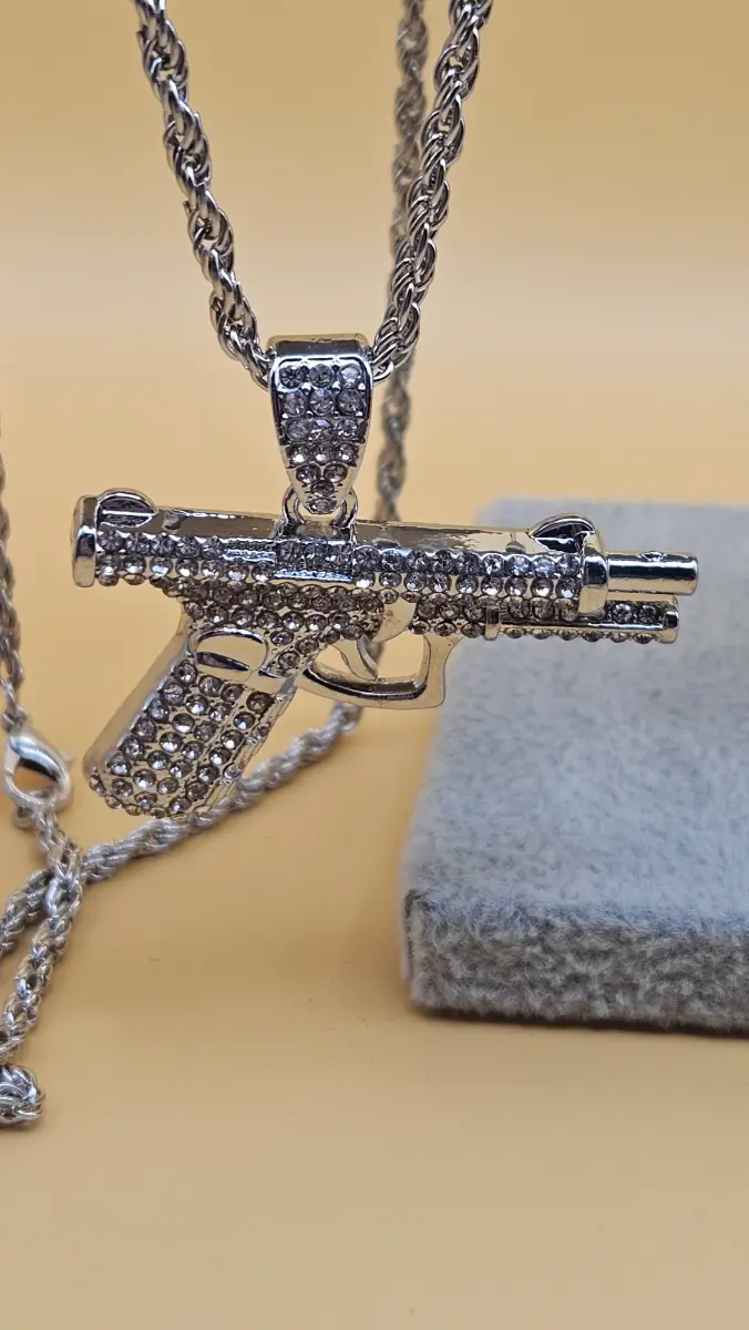 Rhinestone gun pendant chain necklace in silver tone