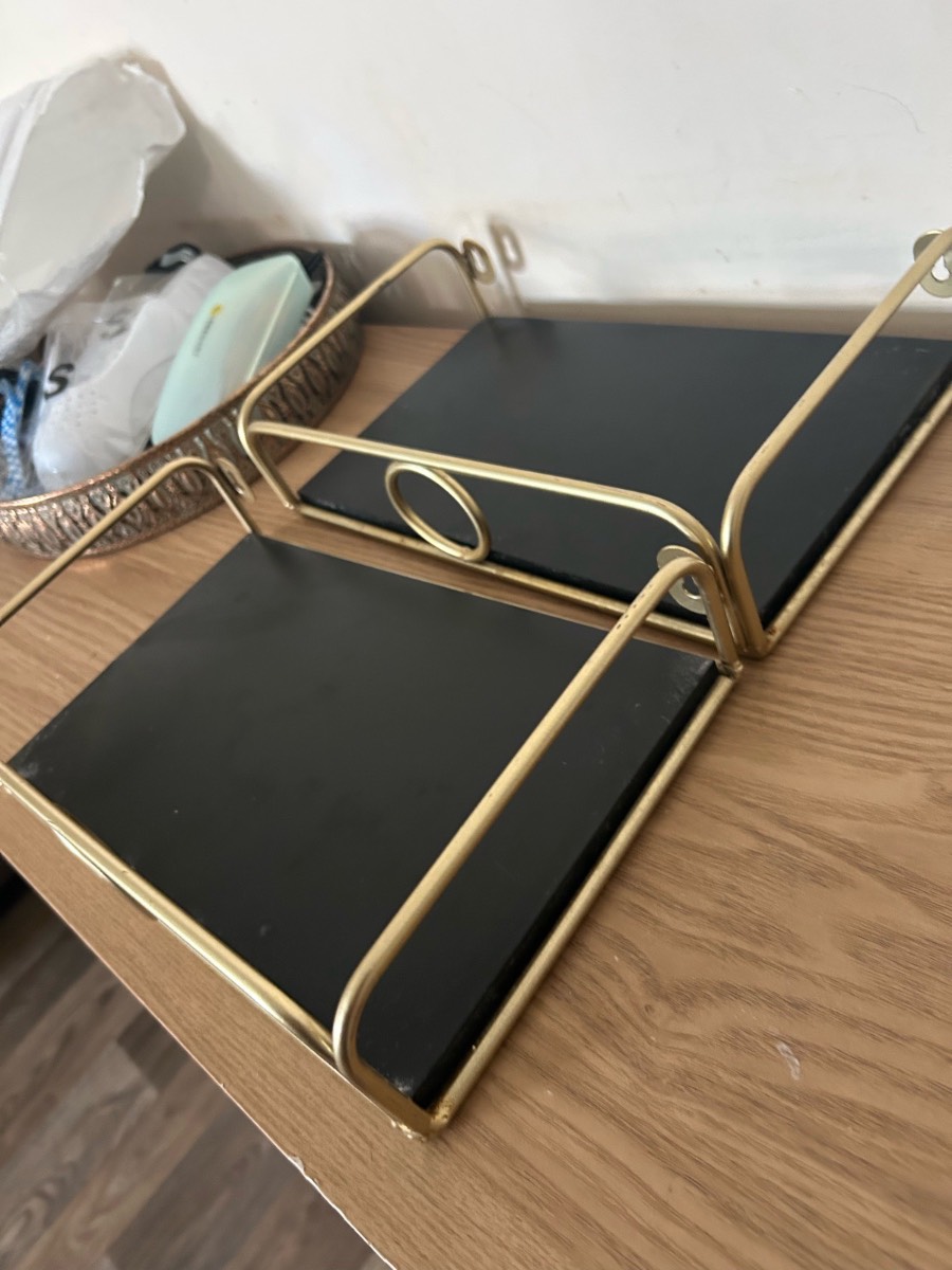 Gold and black shelves