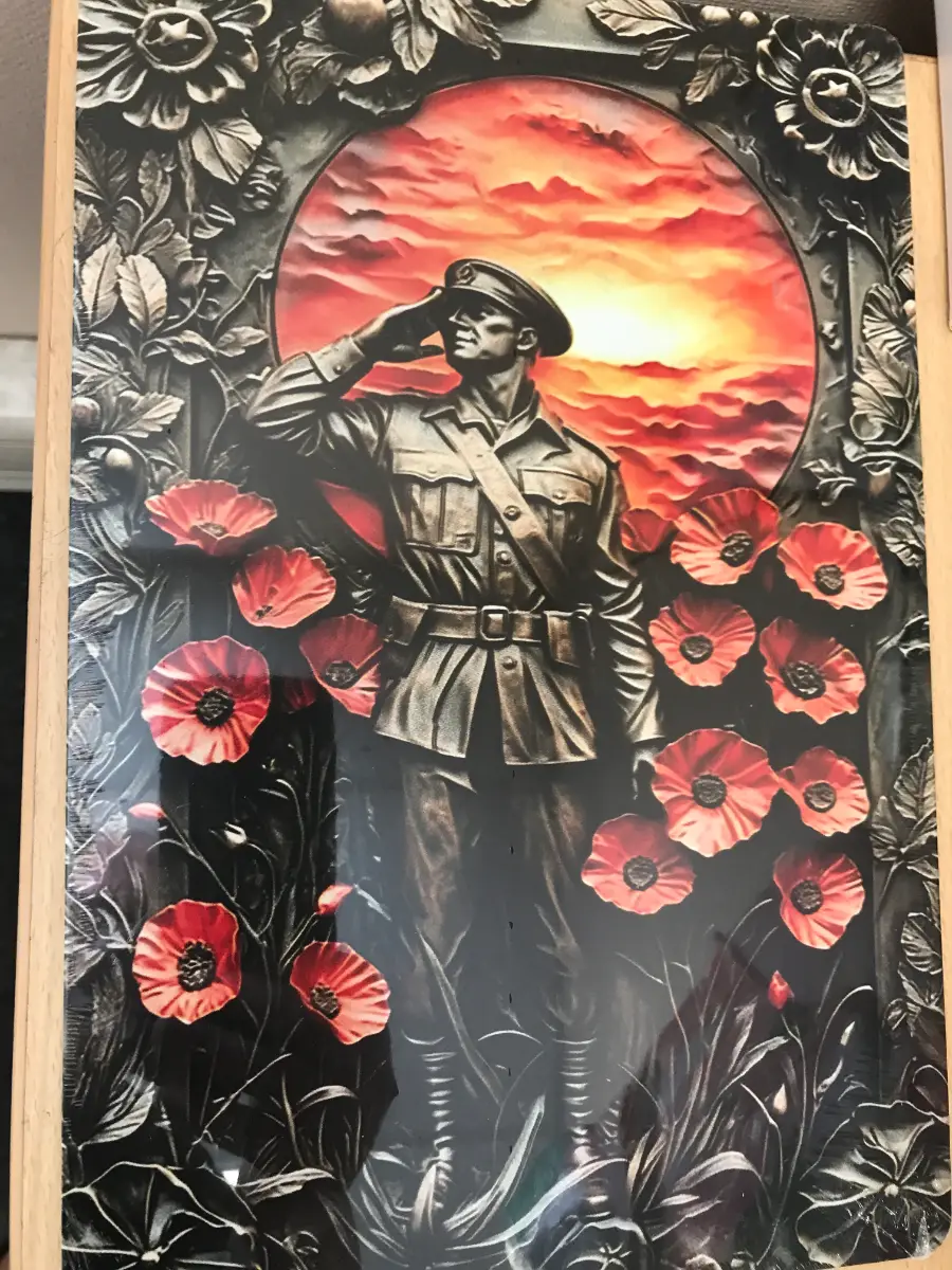 'Lest we Forget' metal plaque