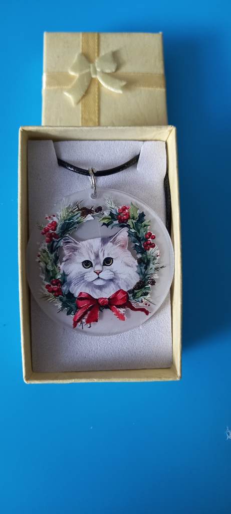 White cat in wreath necklace