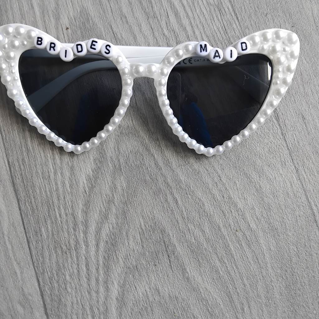 Brand new white bride to be pearl shaoed sunglassess hen party wedding